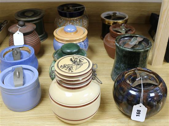 A Royal Doulton Slaters Patent tobacco jar and 11 other tobacco jars, various